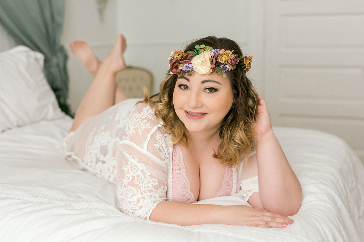 Woman at photo shoot wearing flower crown on her head