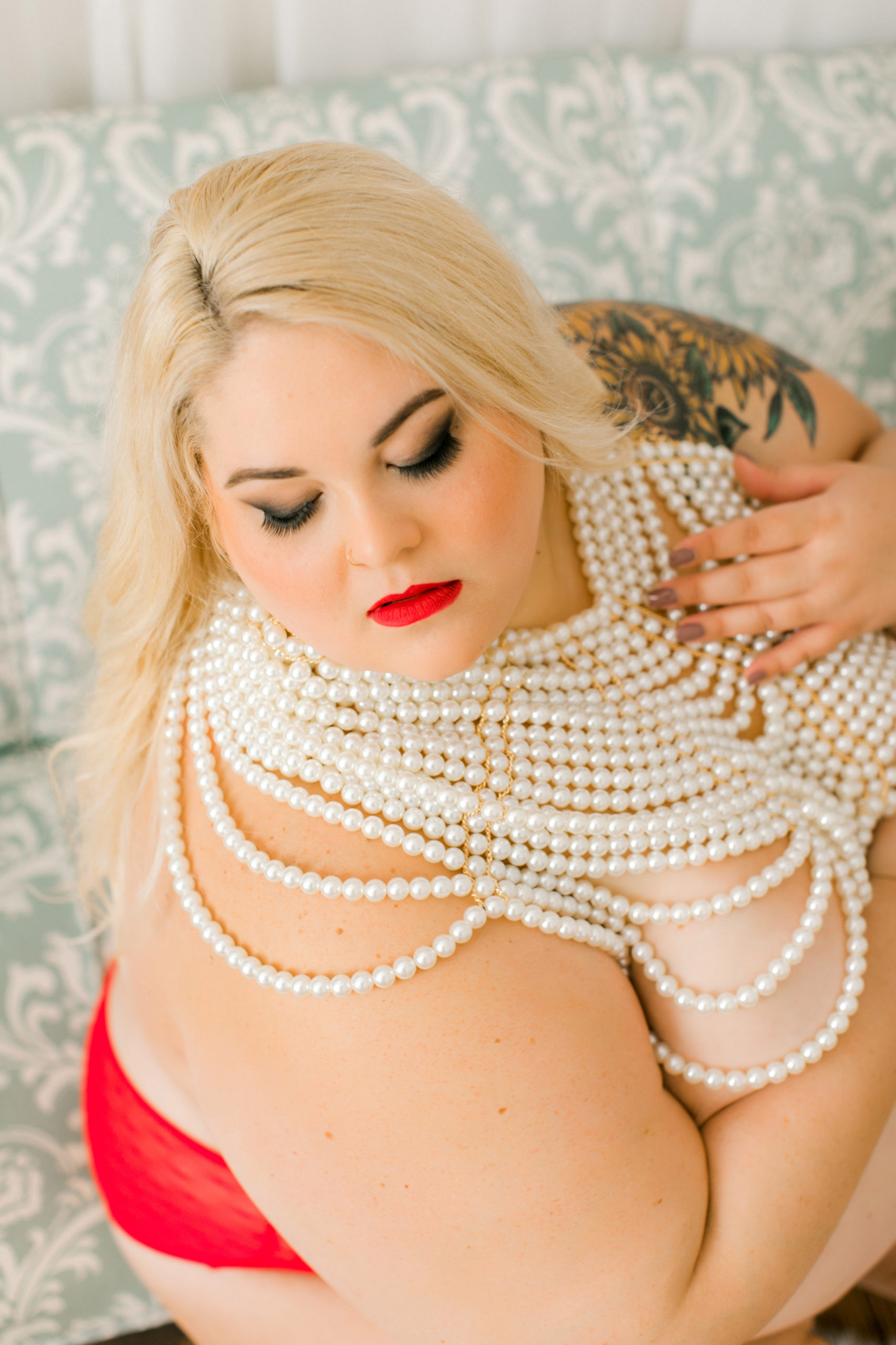 Classy and tasteful boudoir session with elegant pearl top